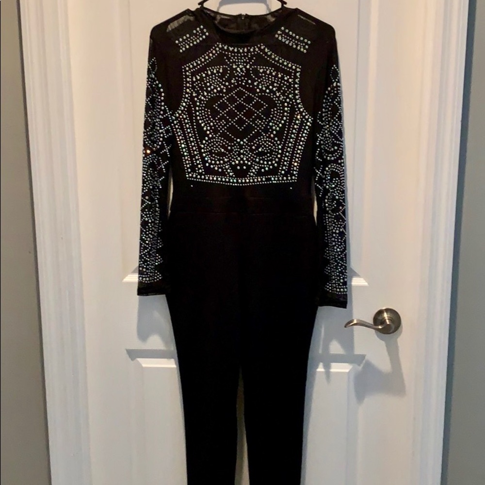 Beautiful beaded jumpsuit w/zipper down the back.